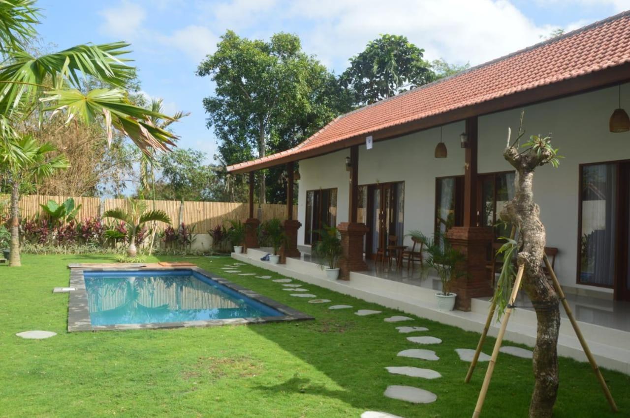 Wiryaroja Guest House Canggu Extérieur photo
