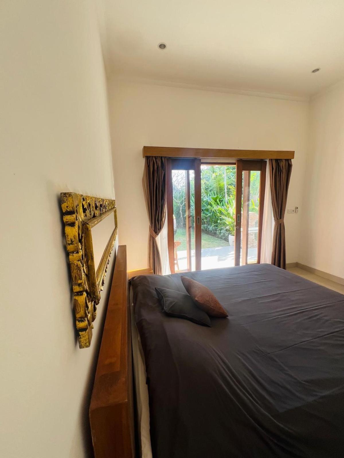 Wiryaroja Guest House Canggu Extérieur photo