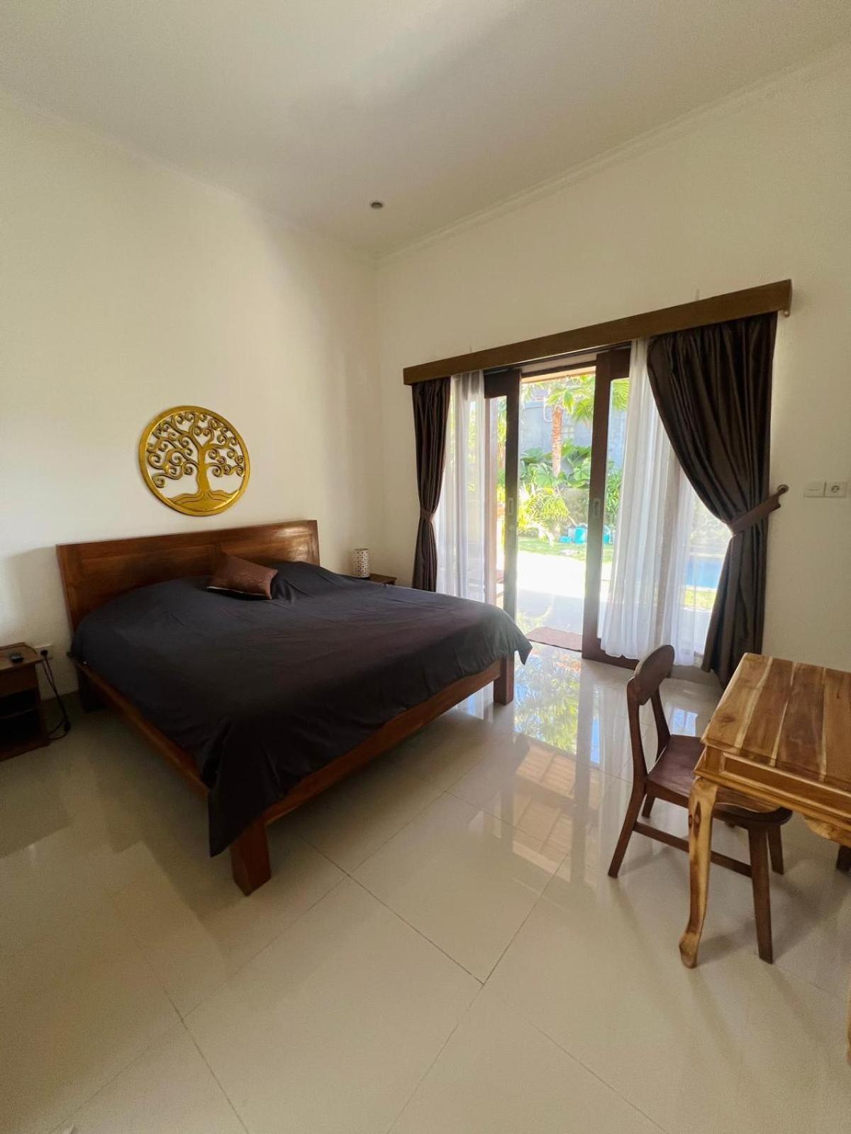 Wiryaroja Guest House Canggu Extérieur photo