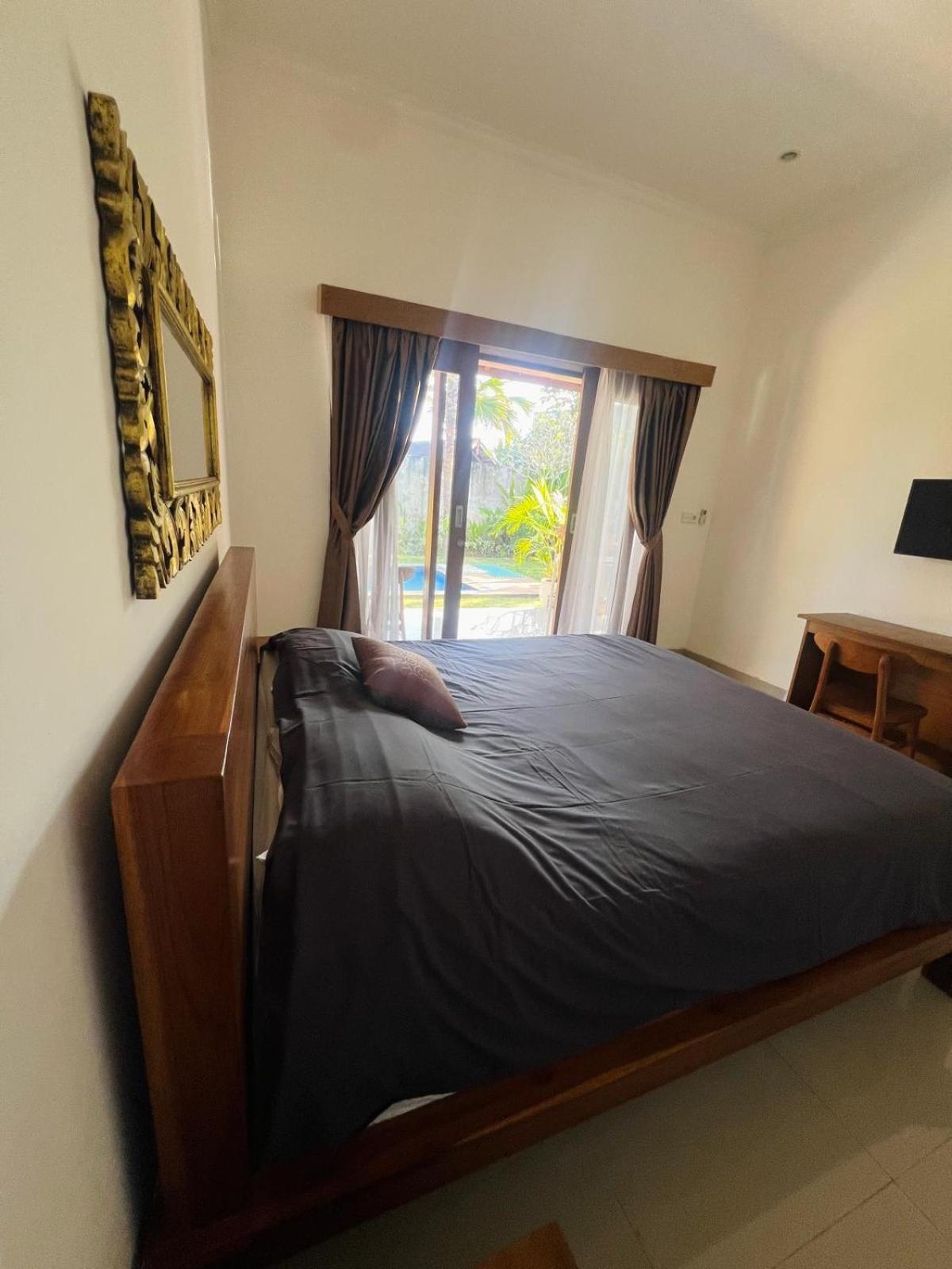 Wiryaroja Guest House Canggu Extérieur photo