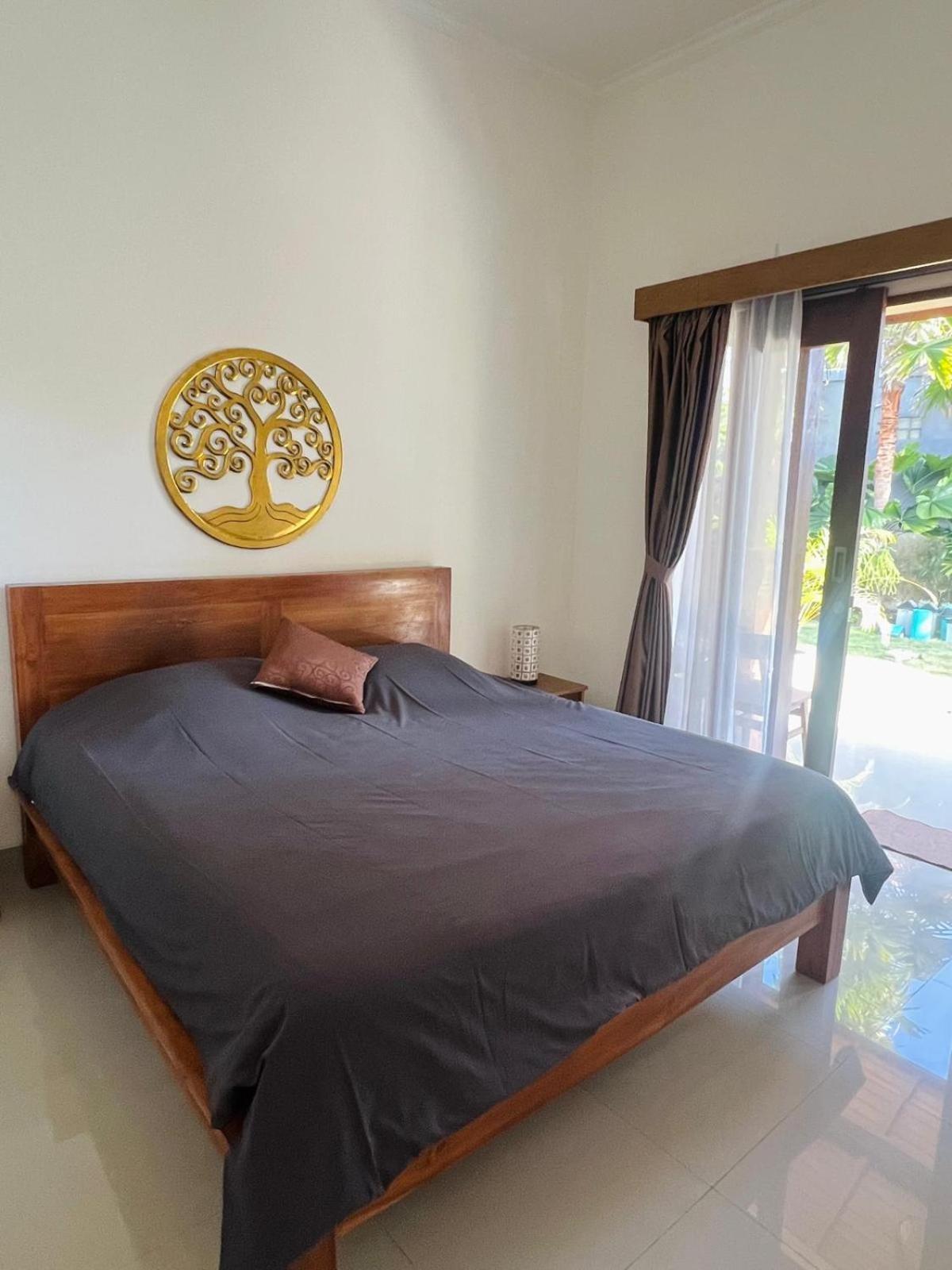 Wiryaroja Guest House Canggu Extérieur photo